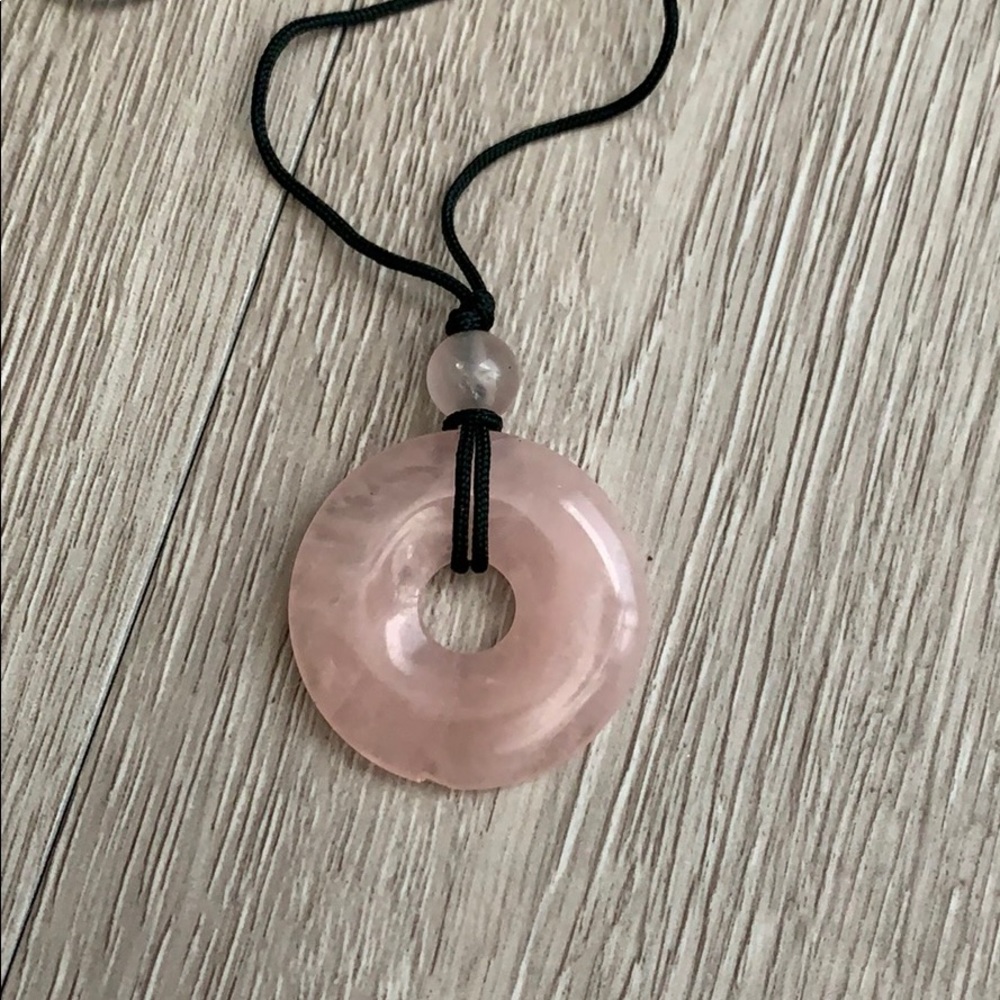 Rose quartz amulet round pendant on rope